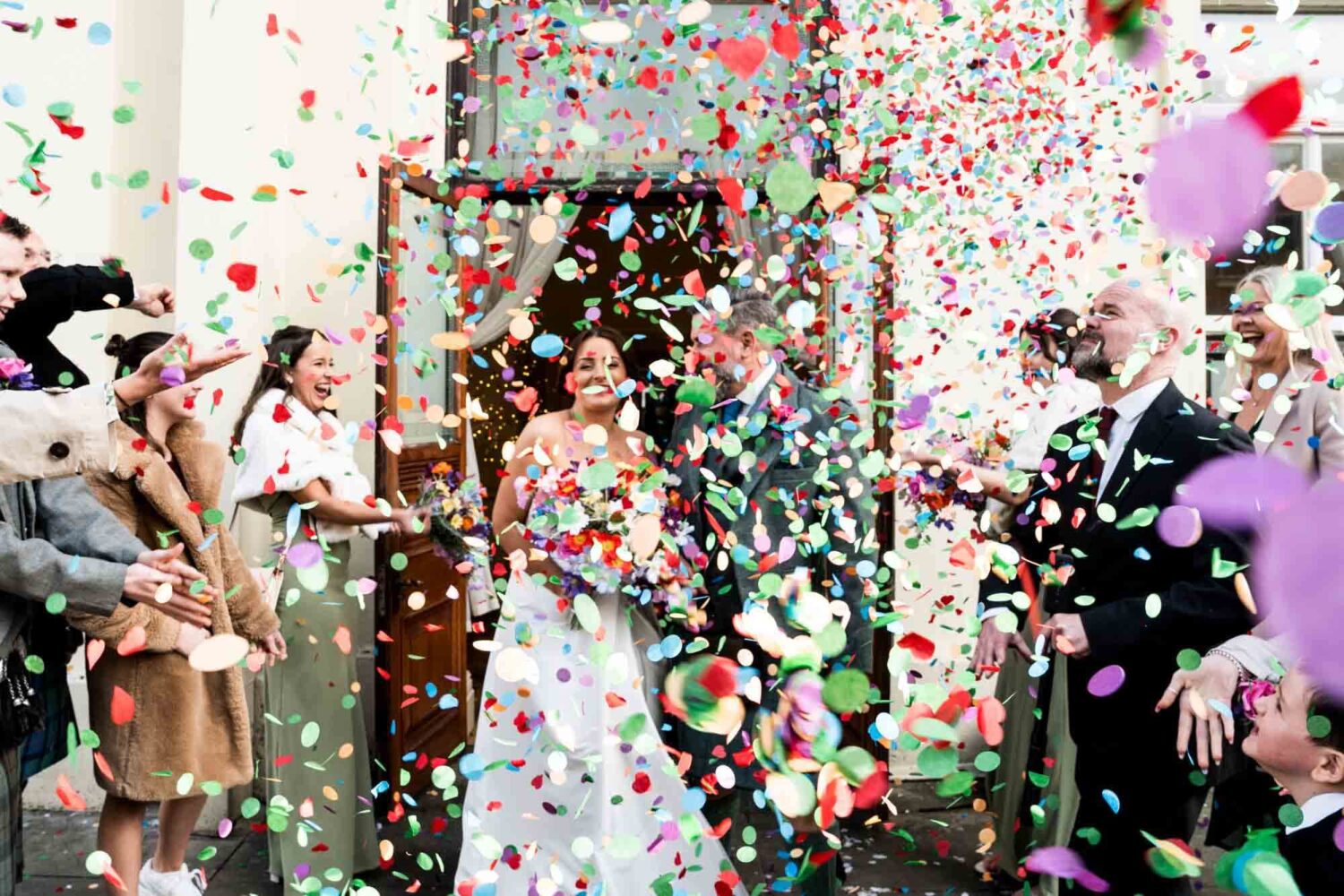 walking out of brighton town hall to loads of confetti
